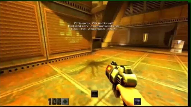 A frame generated by the WHAMM model: a first-person view down a yellow-lit industrial corridor in Quake II, a blaster held at the lower right, the objective text "Establish communication link to command ship" overlaid, and a health readout of 100.